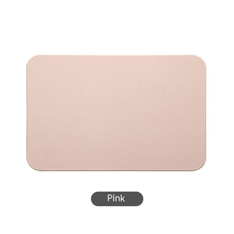 StoneStep diatomite stone bath mat in spa bathroom setting
